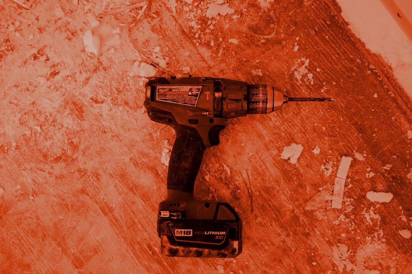 A carpentry drill on a prepared bench.