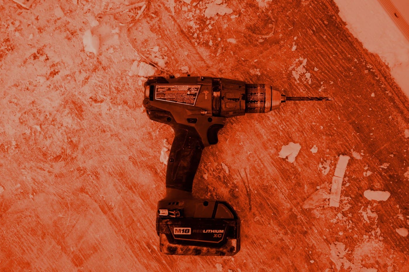 A carpentry drill on a prepared bench.