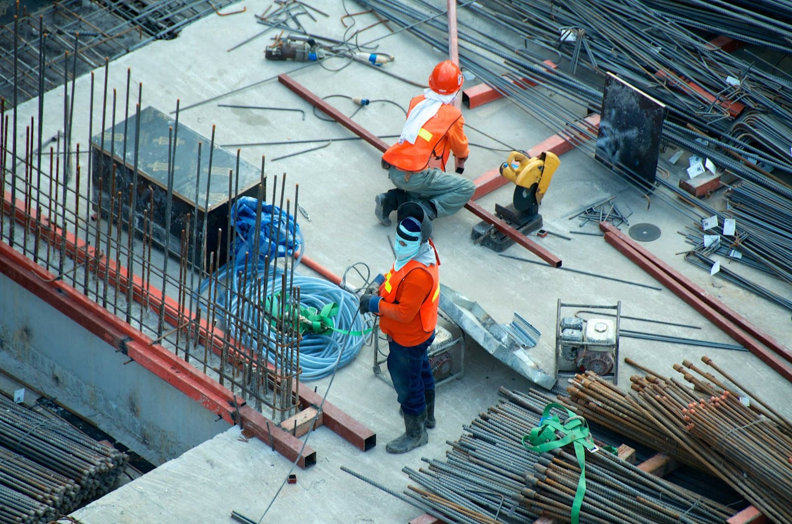 Construction workers on a live site — the trades ISHC places as screened overseas crews.